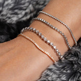 Tennis bracelet with 1.50ct black diamonds in 18K gold